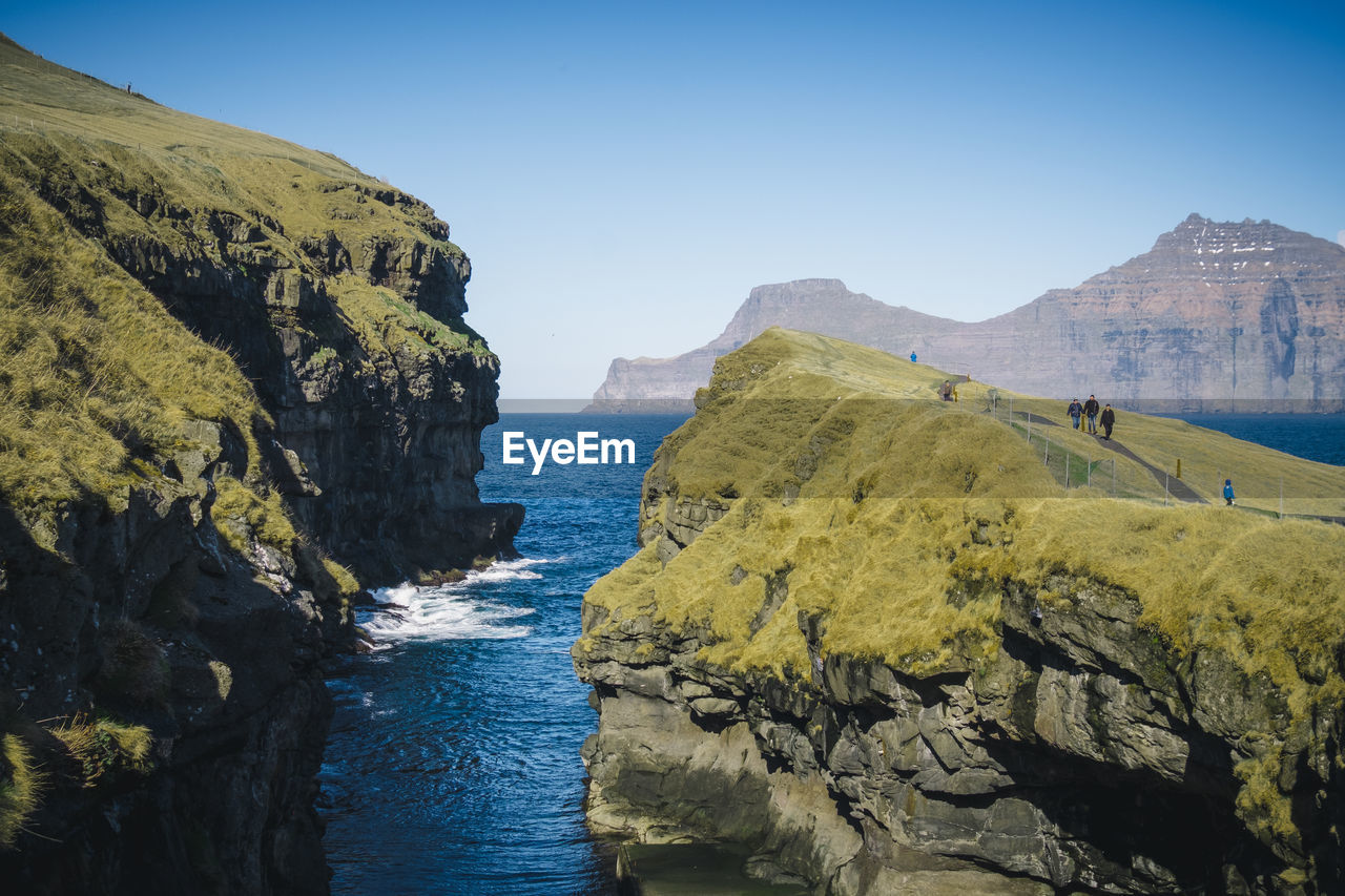 Sea-filled gorge of gjógv, faroe islands