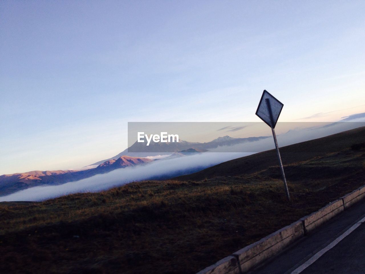 Countryside landscape against clear sky