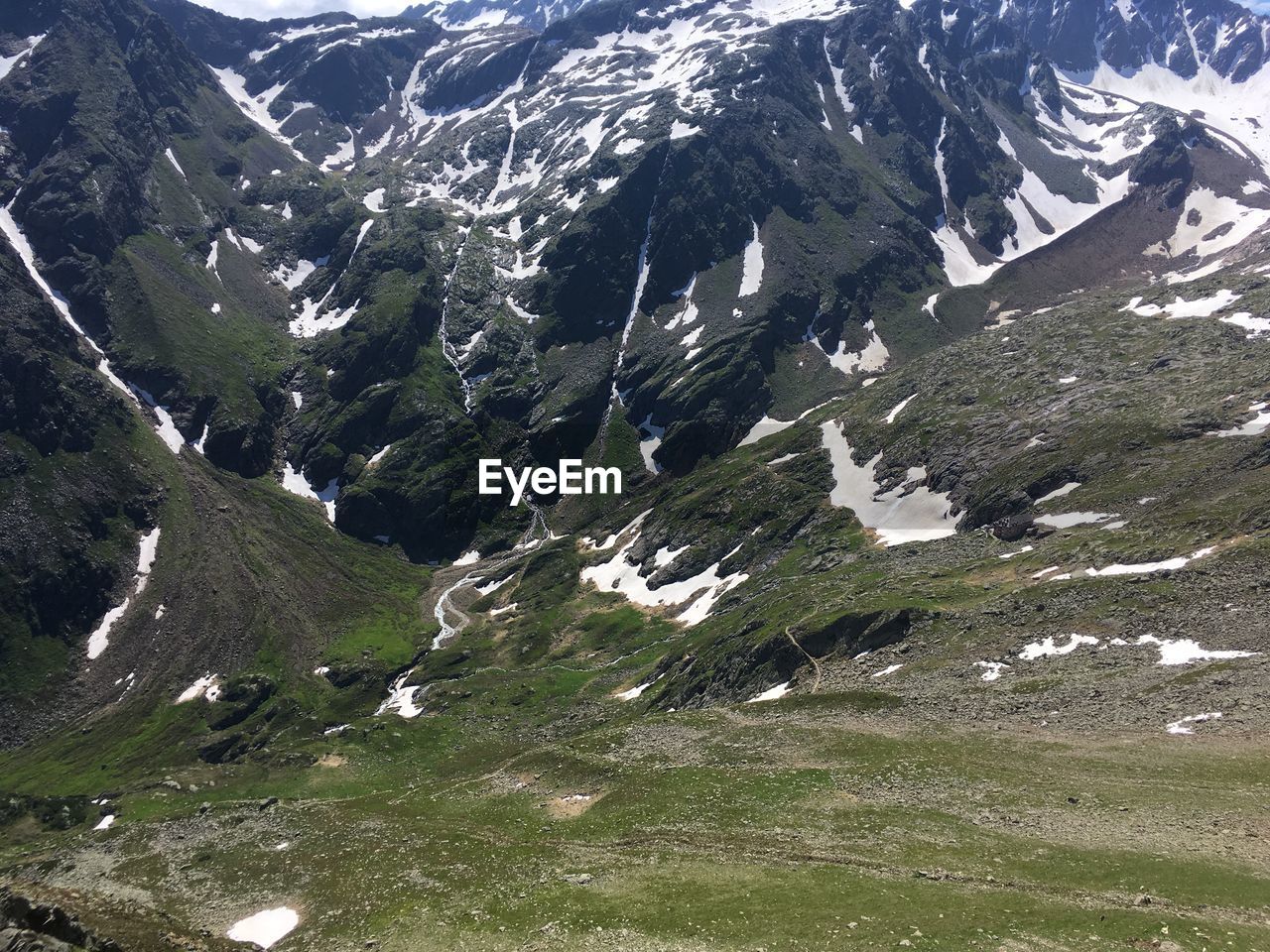 Scenic view of snow covered mountains