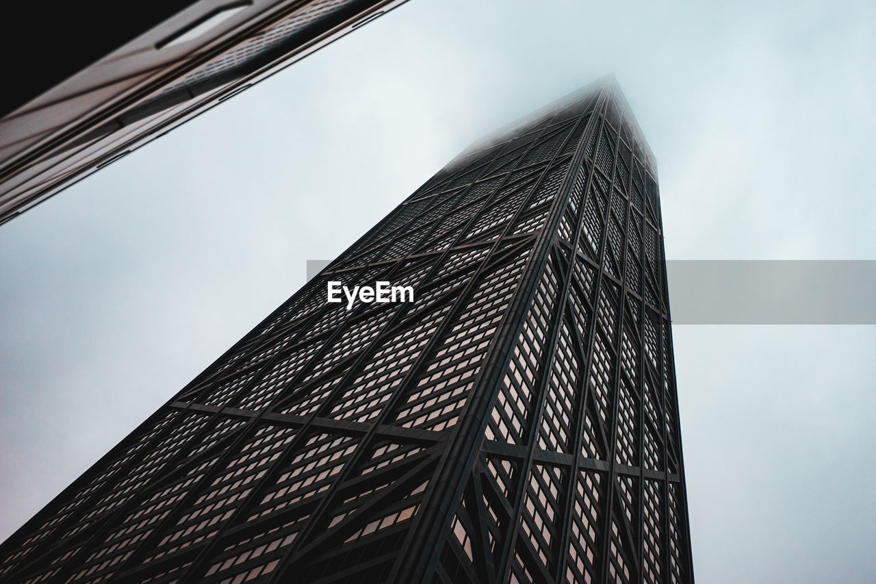 Low angle view of modern building against sky