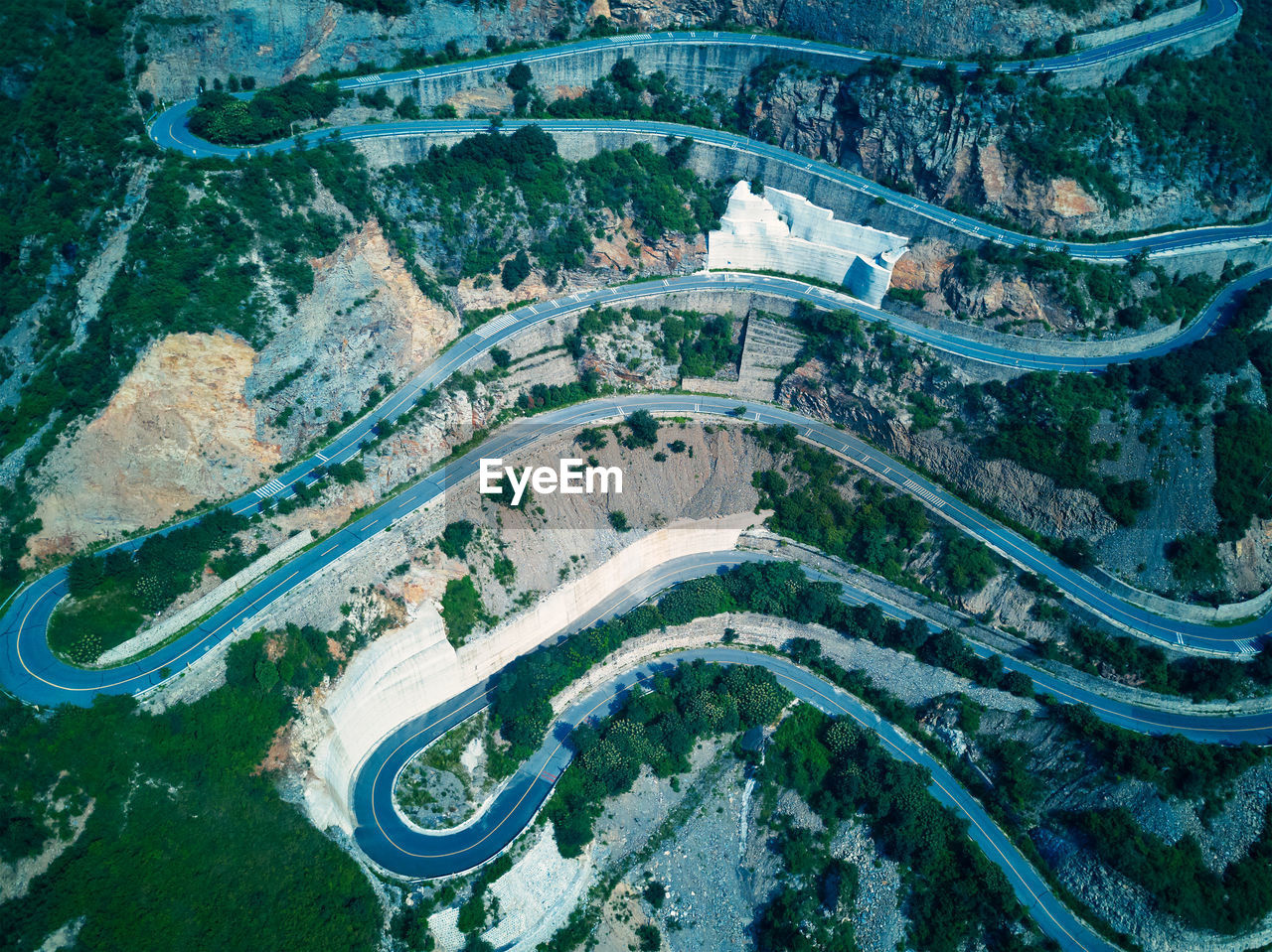 High angle view of road passing through land