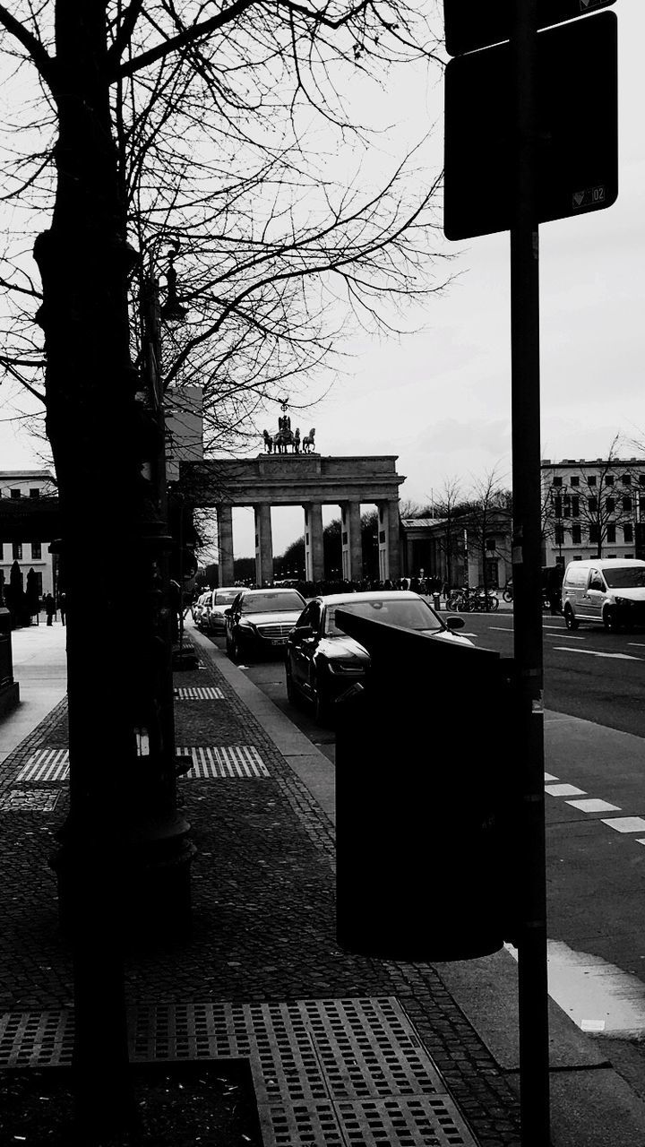 CAR ON STREET IN CITY