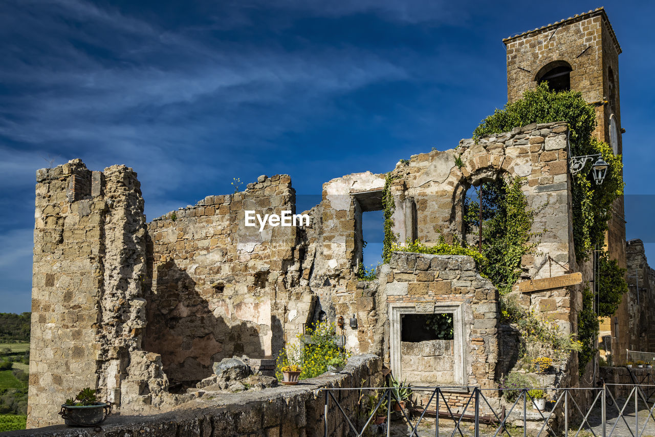 architecture, history, the past, ruins, built structure, sky, old ruin, building, travel destinations, building exterior, ancient, nature, old, travel, ancient history, ruined, cloud, castle, abandoned, no people, tourism, damaged, landmark, stone material, medieval, wall, outdoors, blue, land, plant, rundown, landscape, religion, ancient civilization, day, fortification, abbey, bad condition, place of worship, historic site