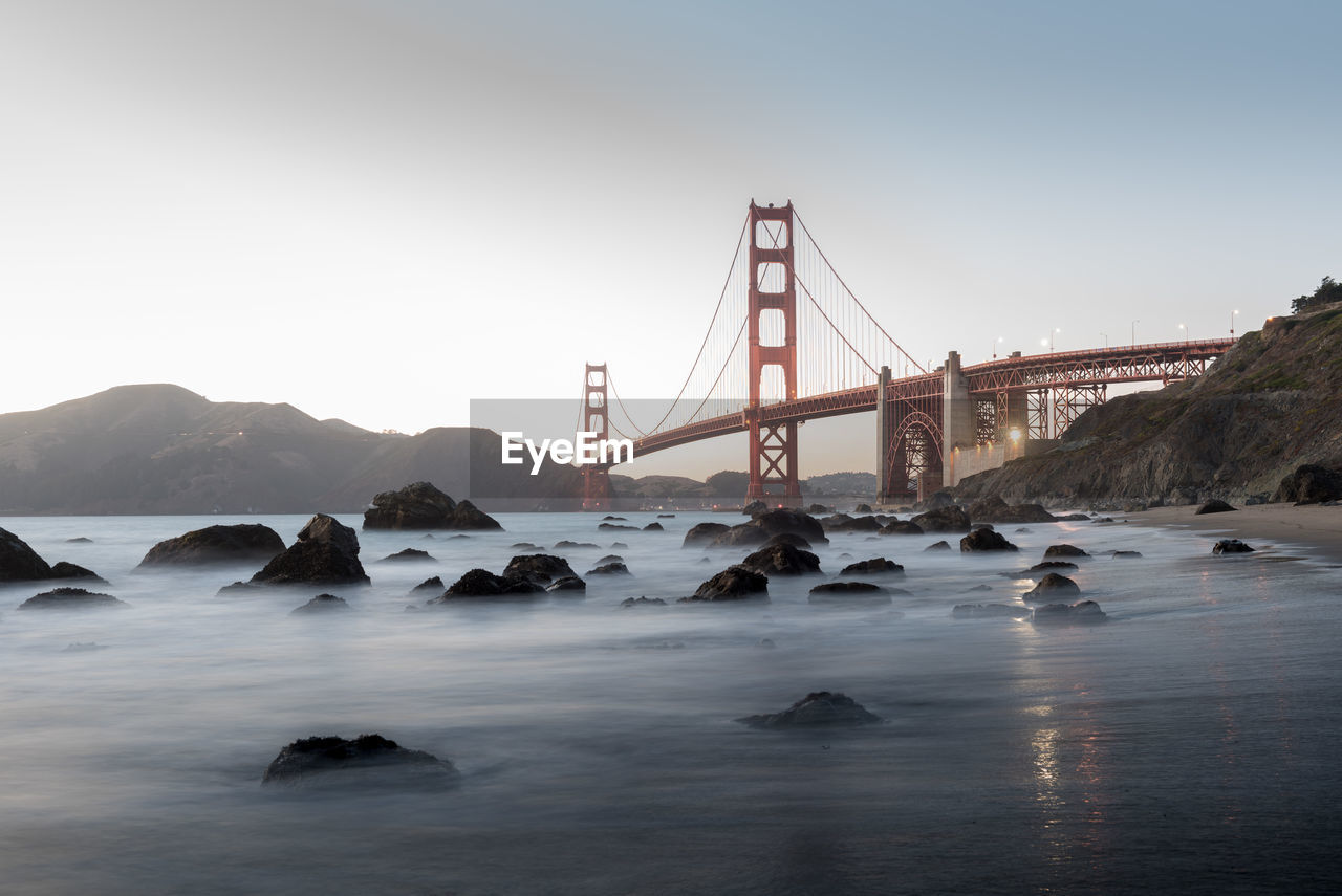 VIEW OF SUSPENSION BRIDGE AT SEA