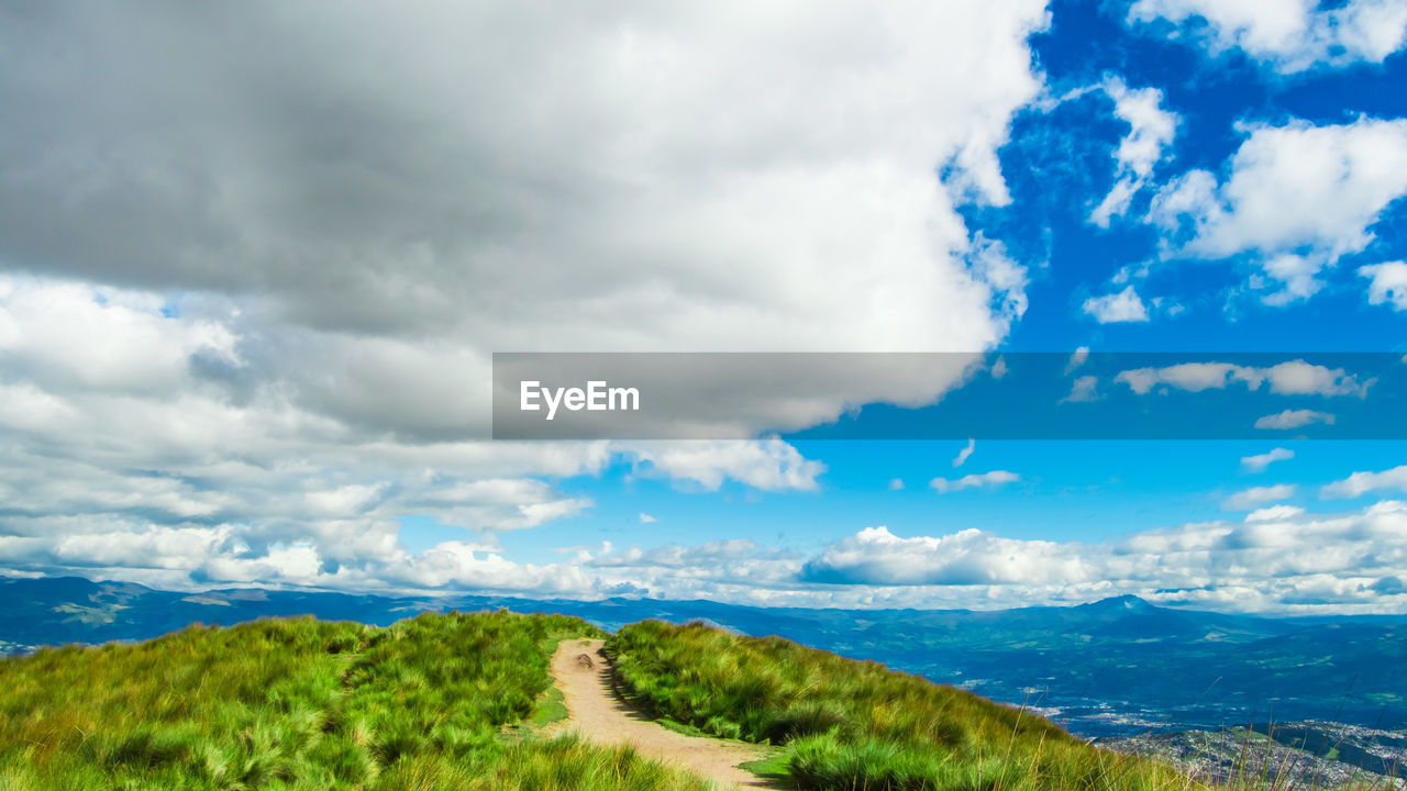 PANORAMIC VIEW OF ROAD ALONG LANDSCAPE AND SKY