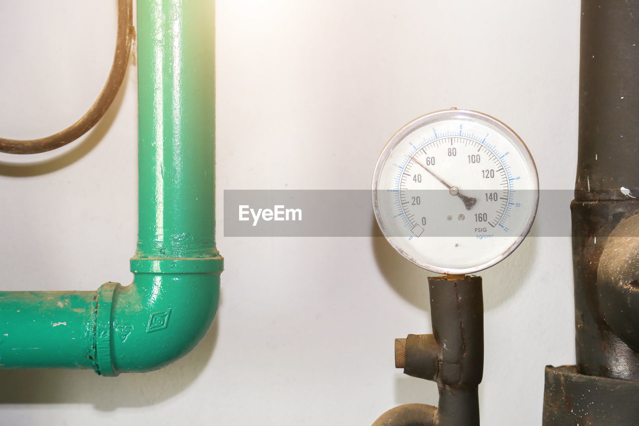 Pressure gauge psi meter in pipe and valves of fire emergency system industry.