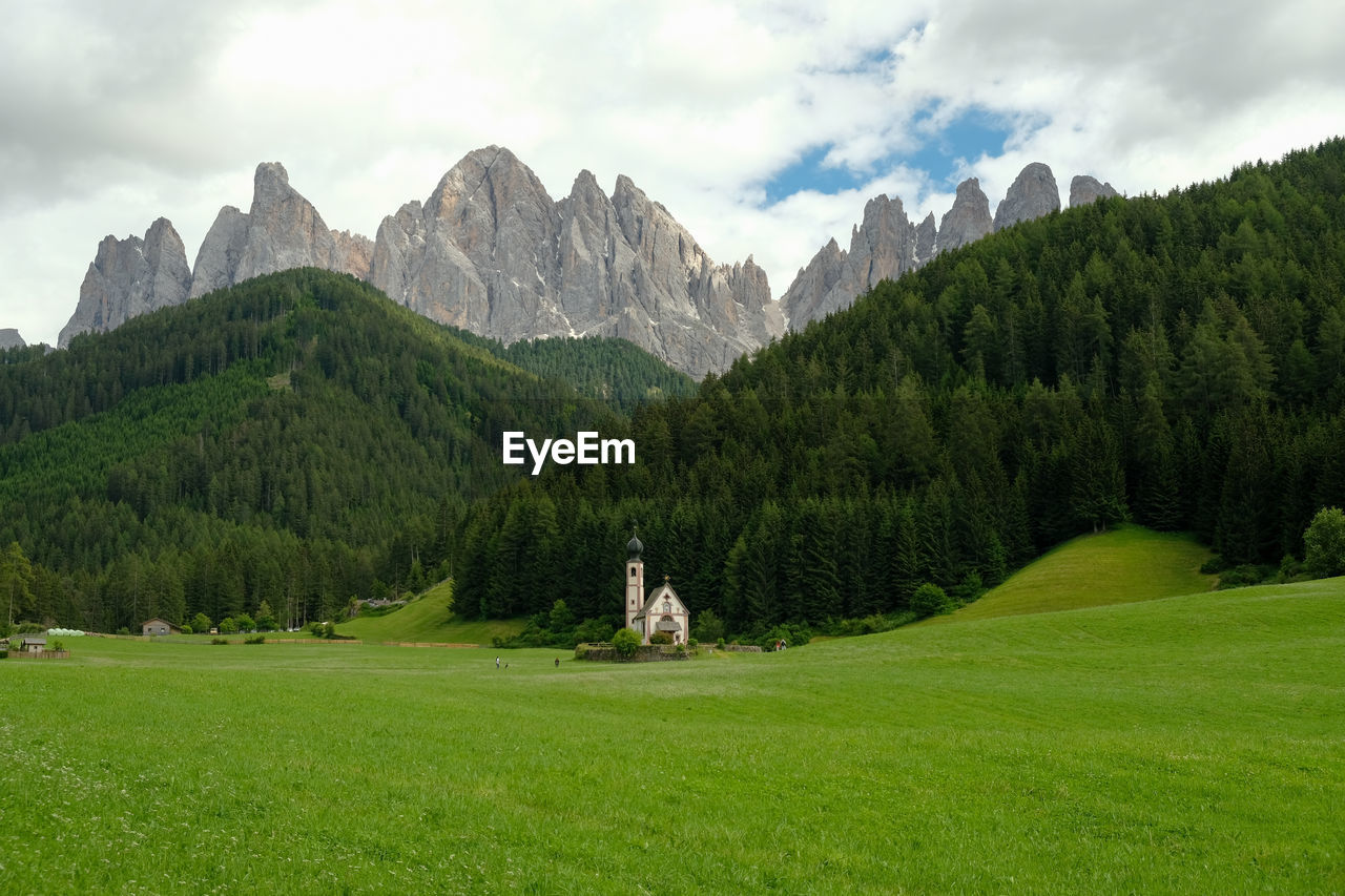 Scenic view of landscape and mountains against sky