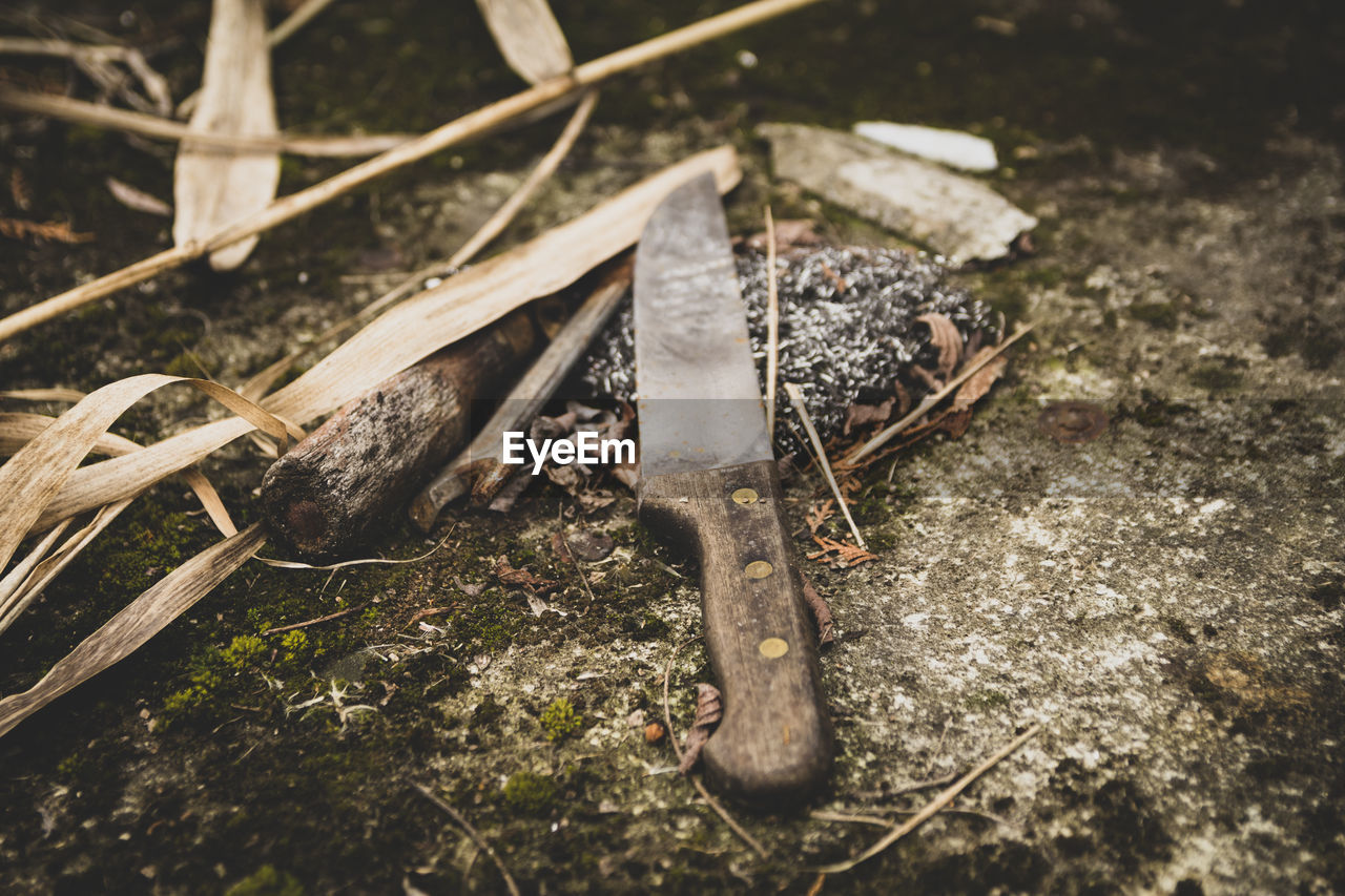 High angle view of knife on field