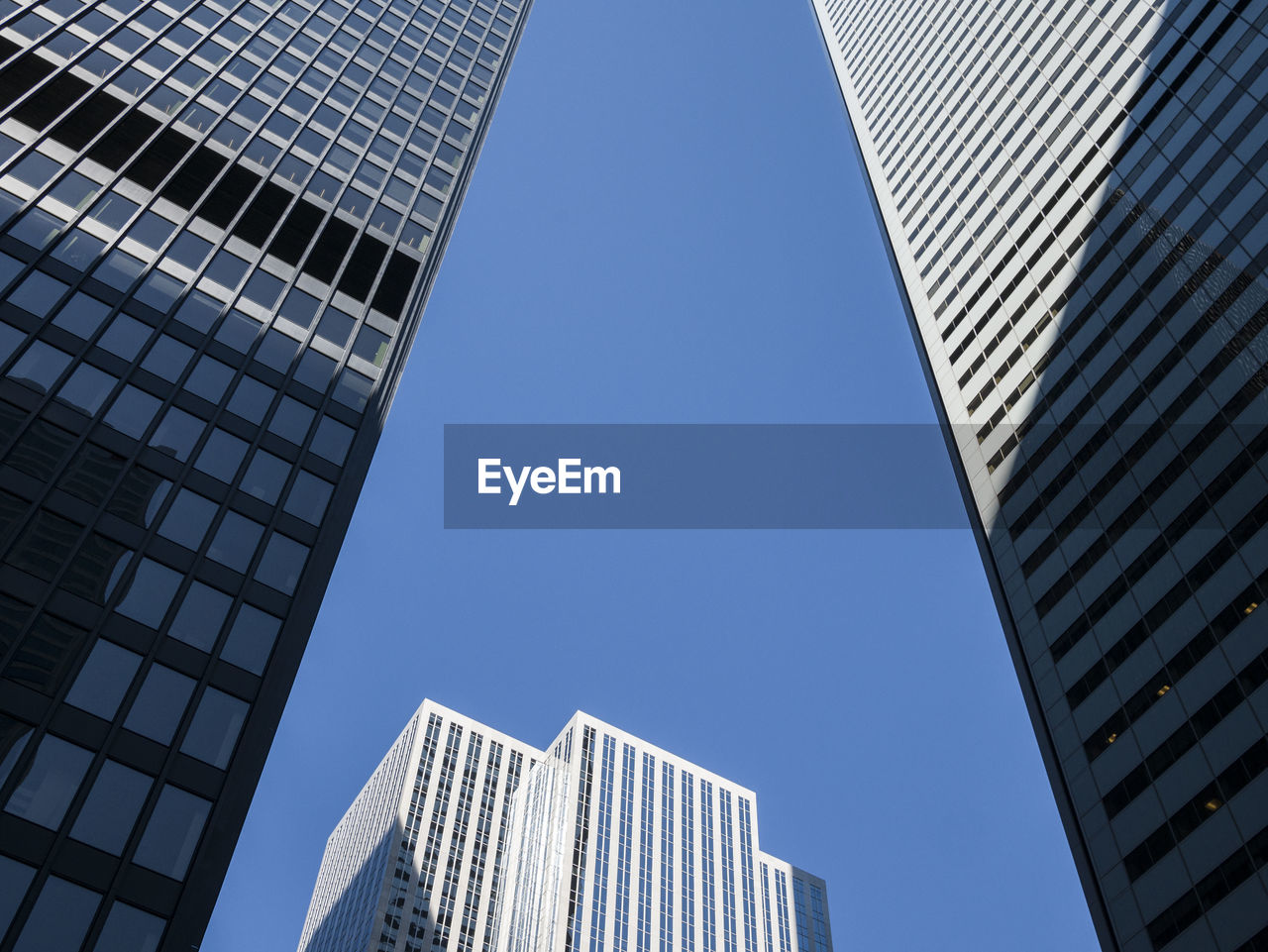 Low angle view of modern building against clear sky