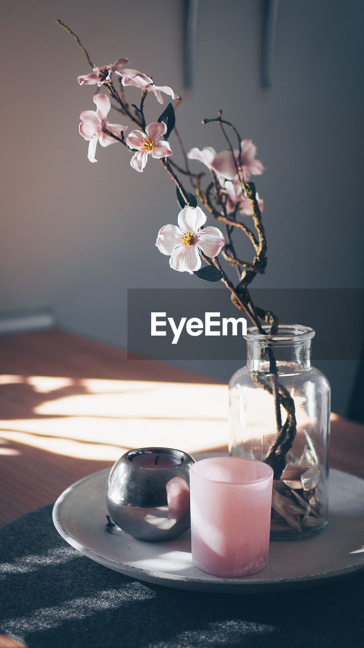 Close-up of flower vase on table