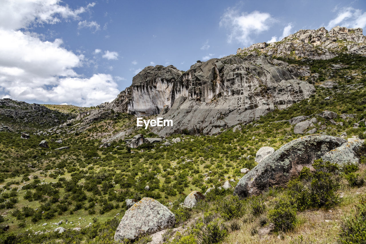 Scenic view of rocky mountains against sky