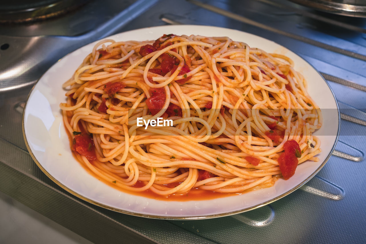 High angle view of noodles in plate on table