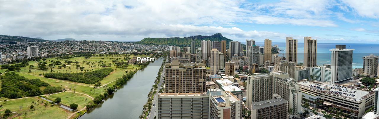 High angle view of buildings in city against sky