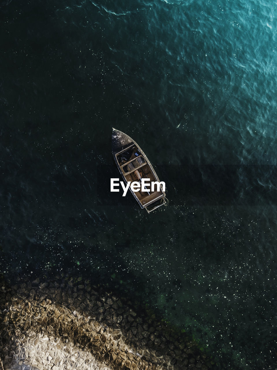 High angle view of abandoned floating on sea