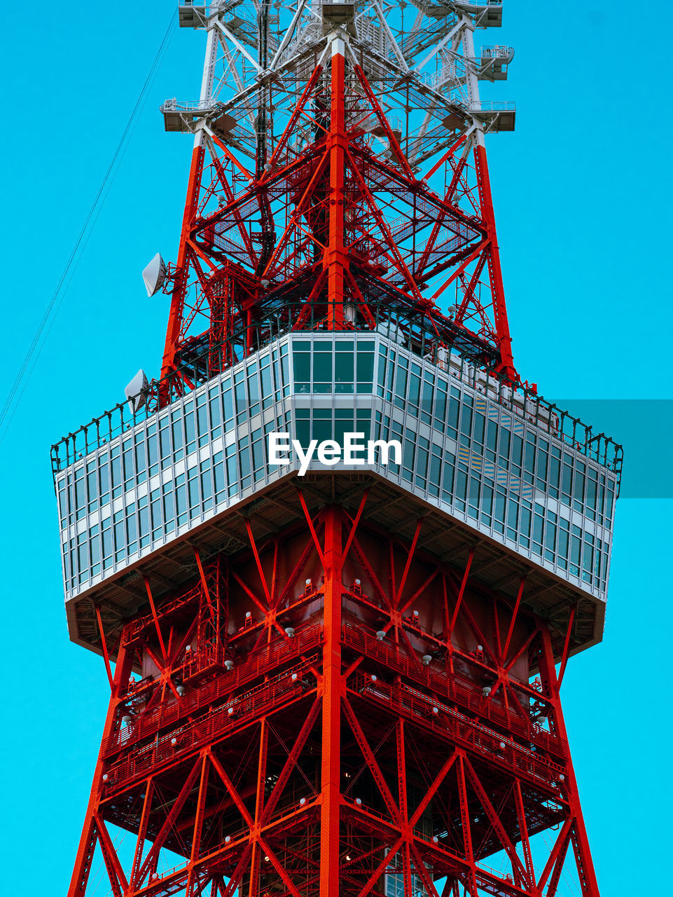 The central viewing platform of the tokyo tower under a blue sky