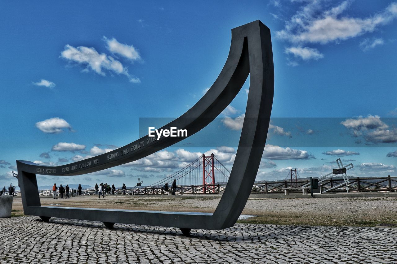 PANORAMIC VIEW OF PEOPLE IN FRONT OF SKY