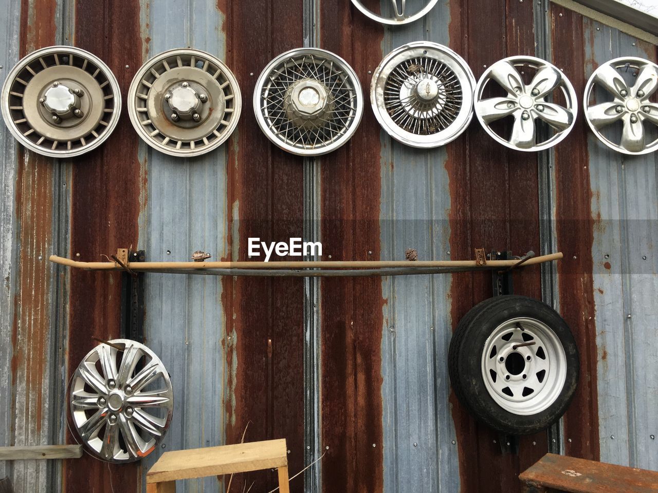 Close-up of wheel/ old hubcaps