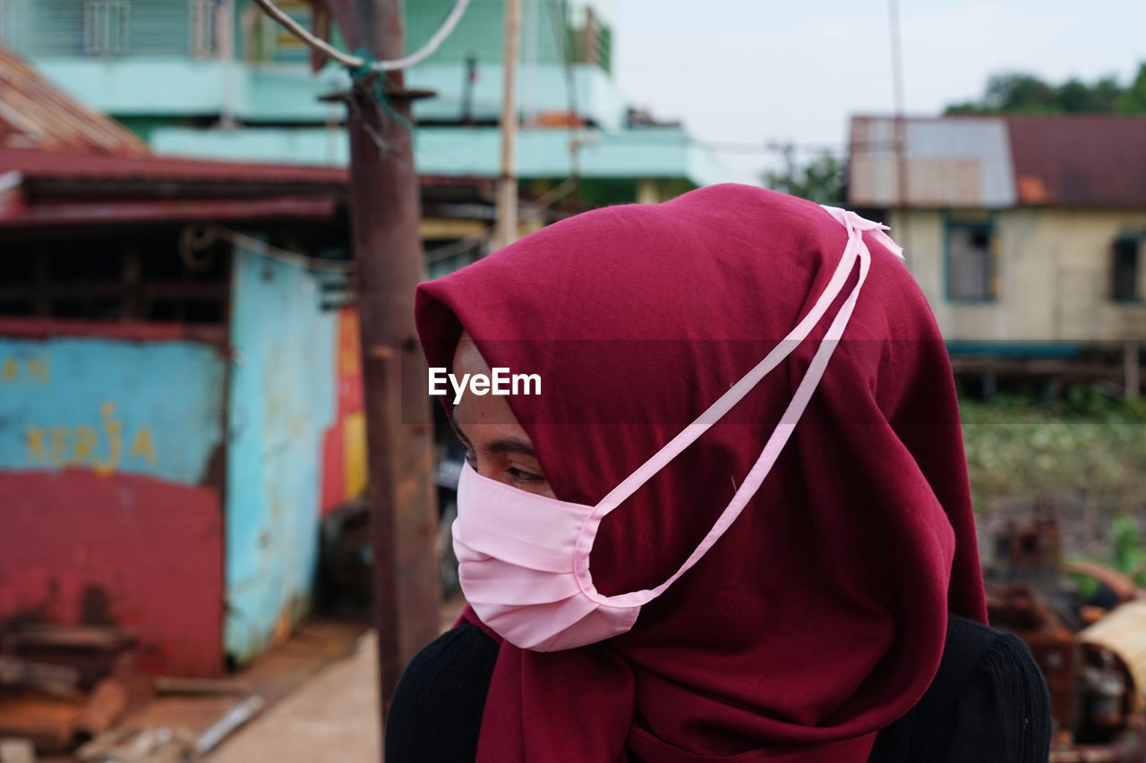 Close-up of woman wearing mask