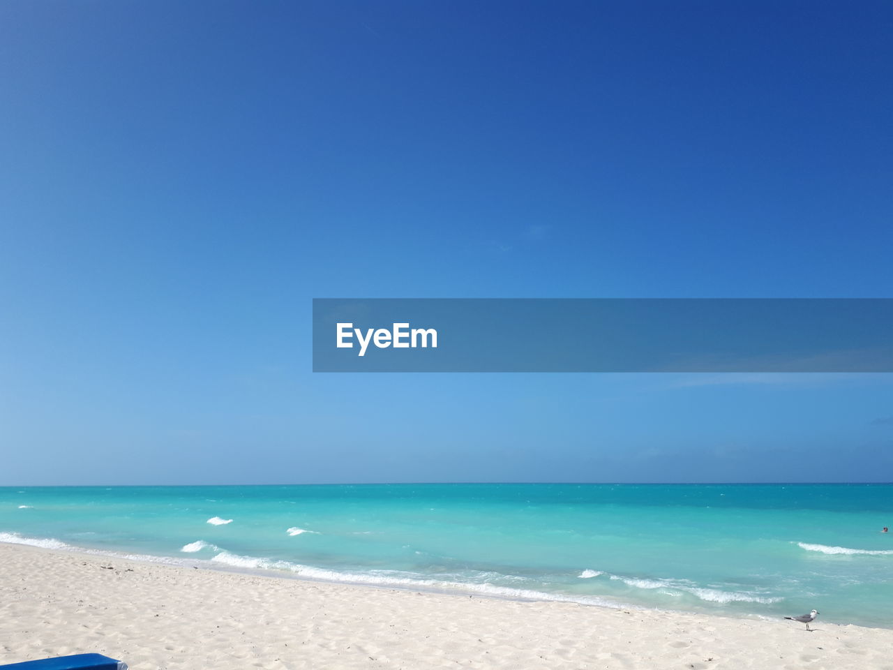 SCENIC VIEW OF SEA AGAINST BLUE SKY