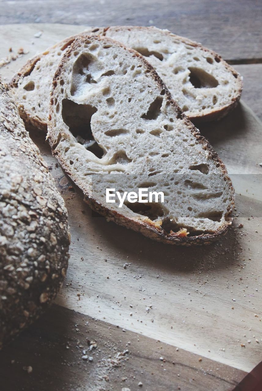 High angle view of bread on cutting board