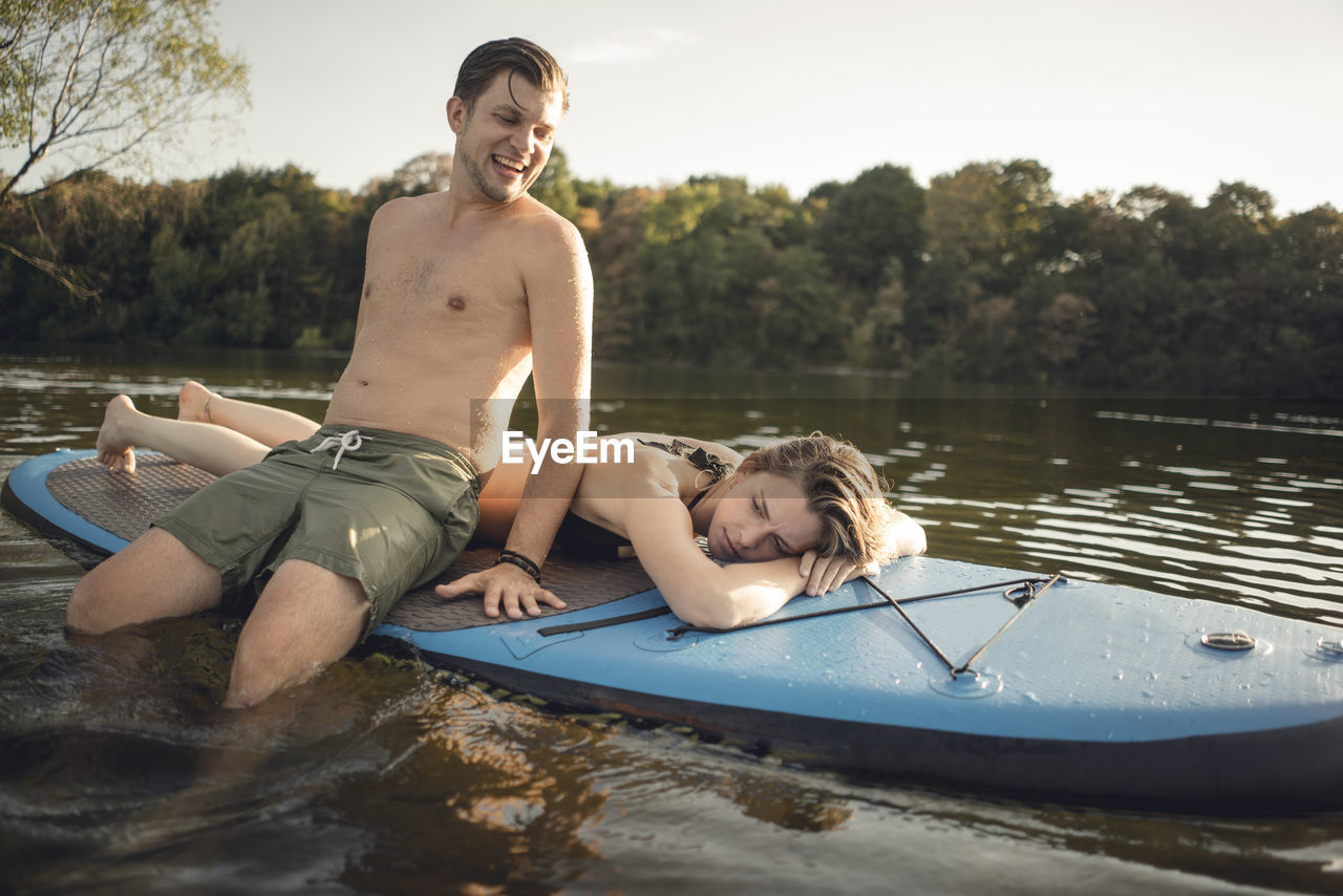 Youple on the lake, relaxing on a paddleboard