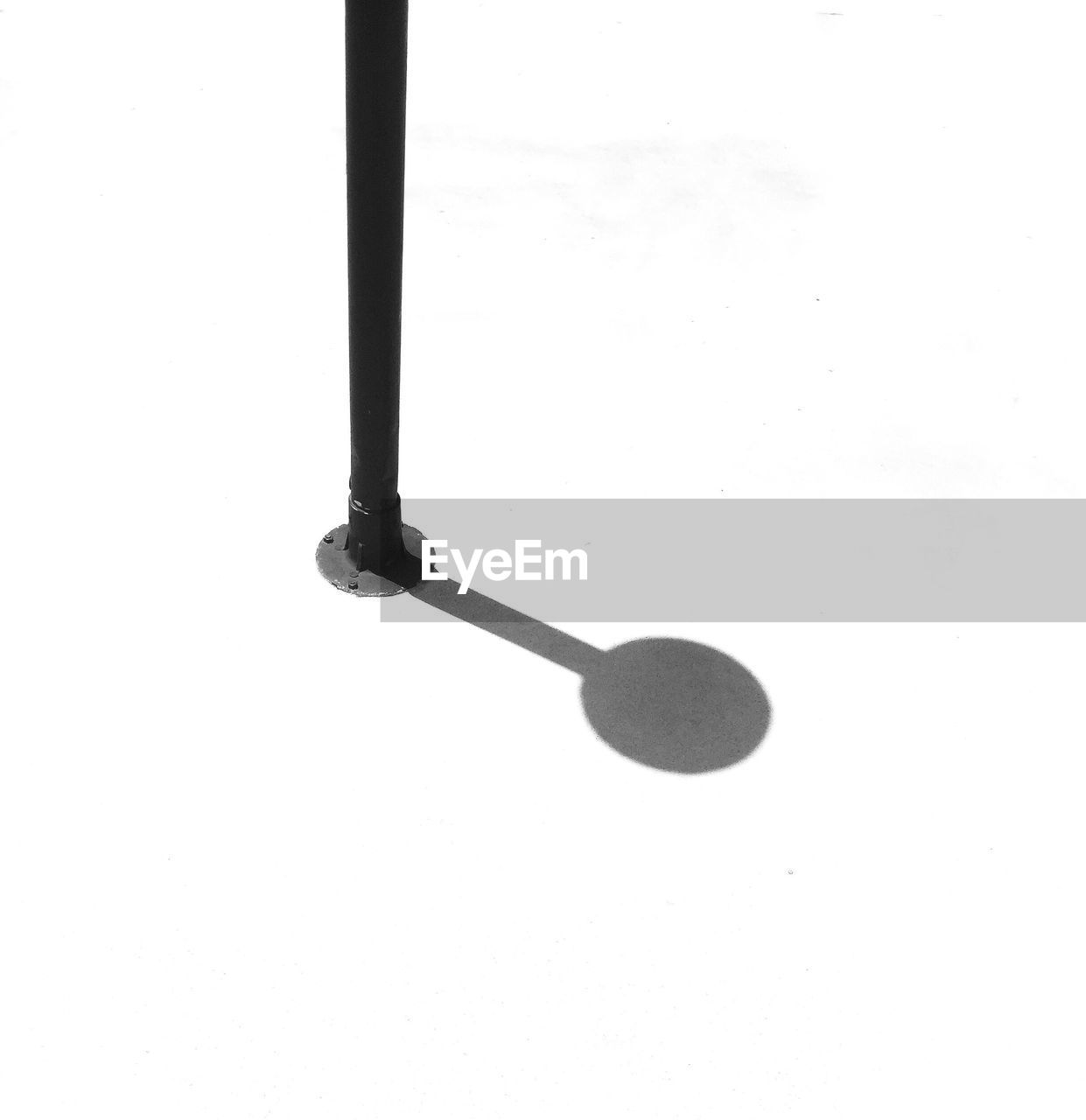 Pole with shadow