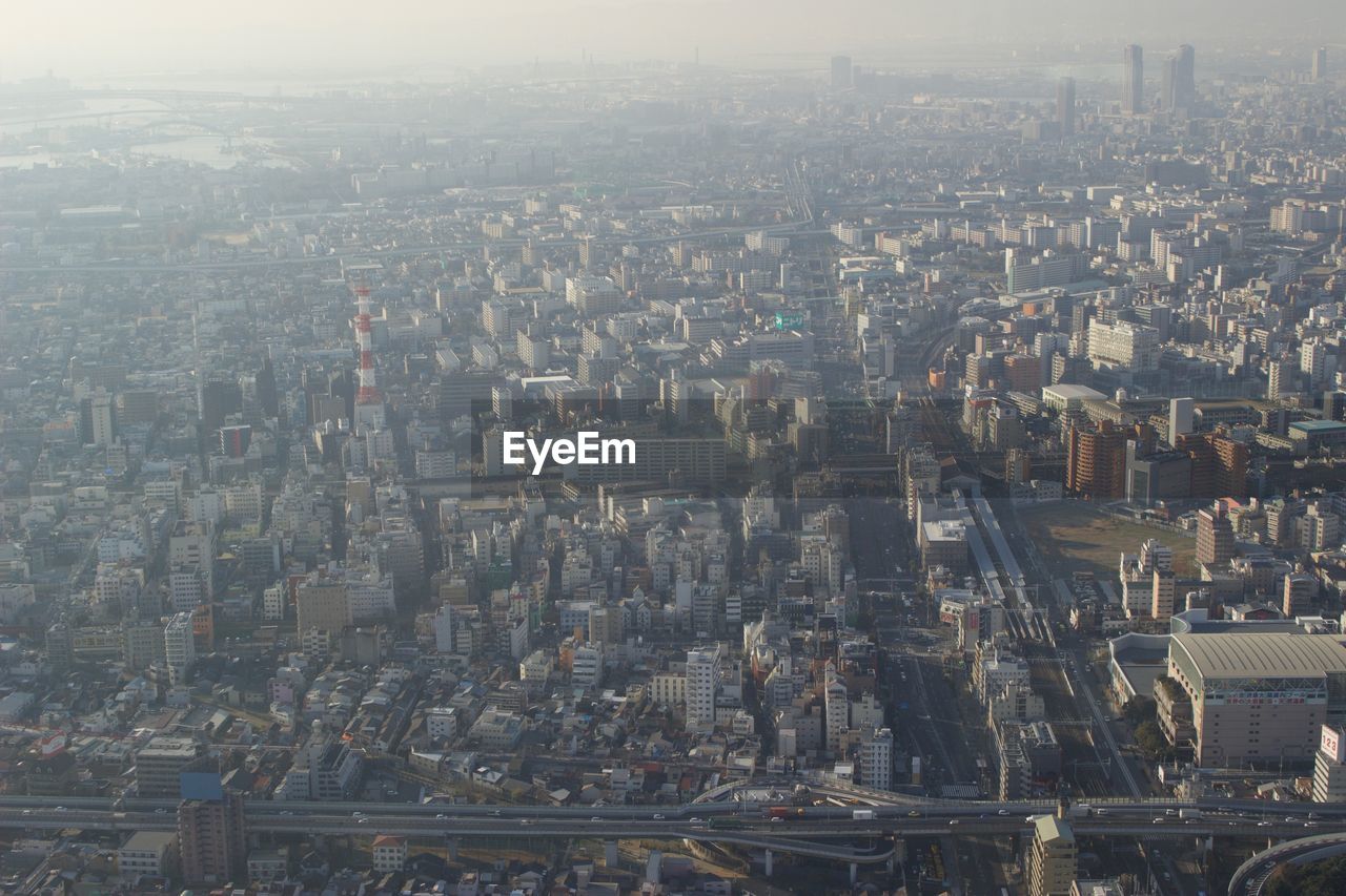 AERIAL VIEW OF CITYSCAPE AND SKY