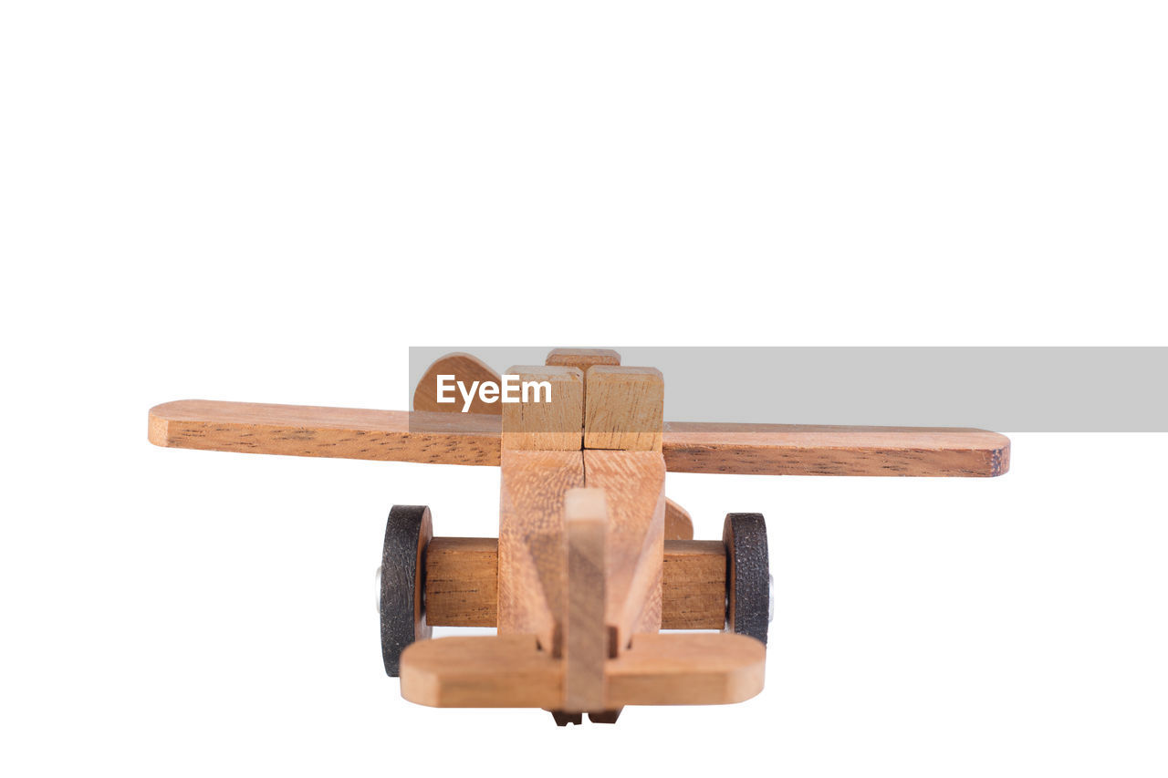 CLOSE-UP OF TOY AGAINST WHITE BACKGROUND