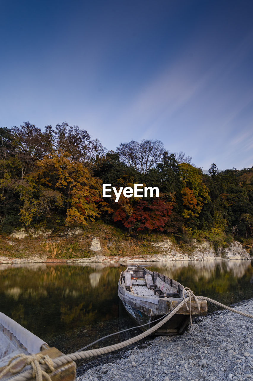 Scenic view of lake against sky during autumn