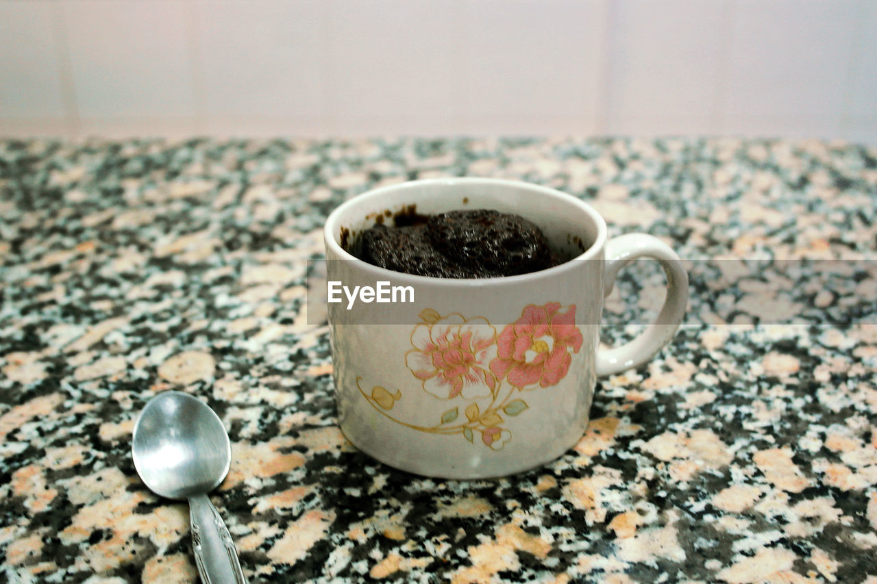 Close-up of black tea on table