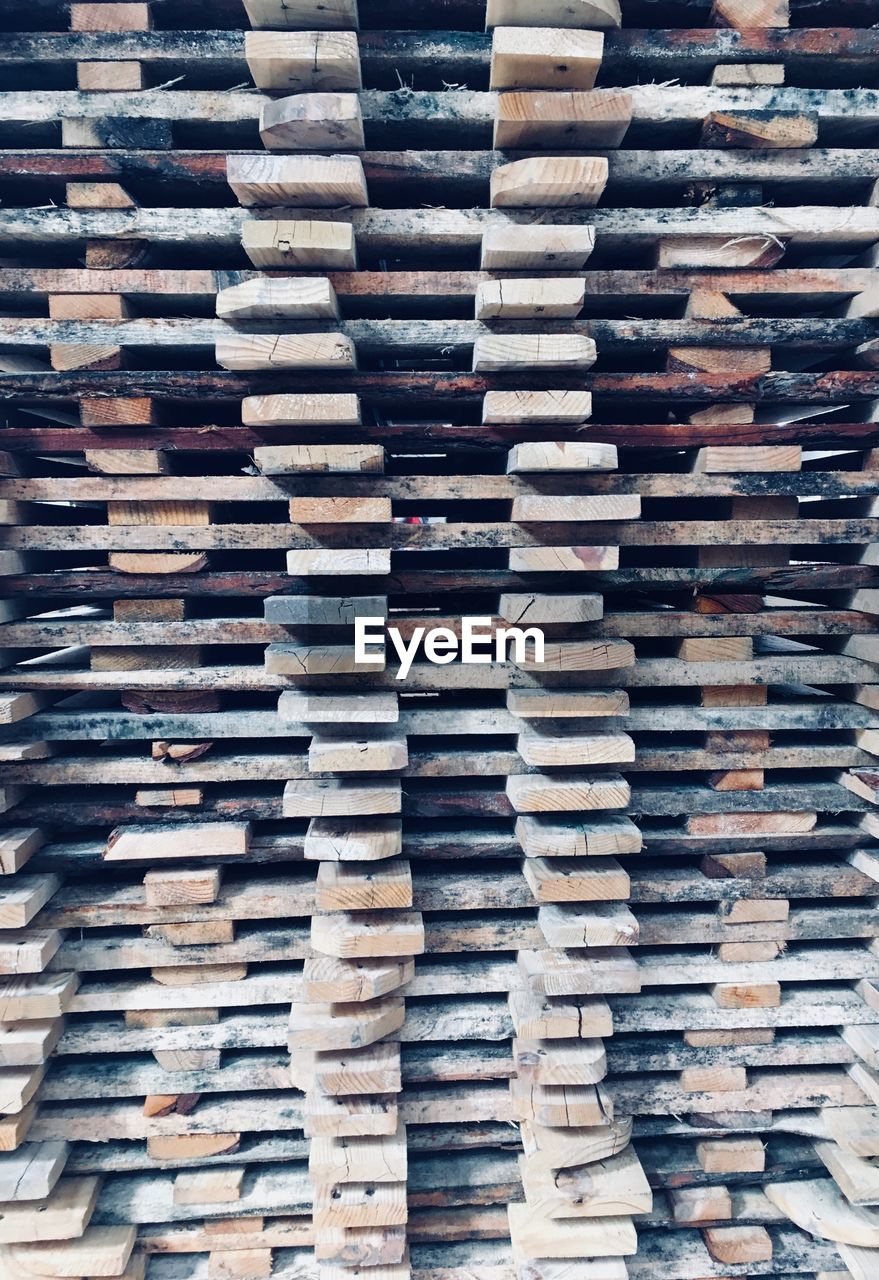 Full frame shot of stacked wood