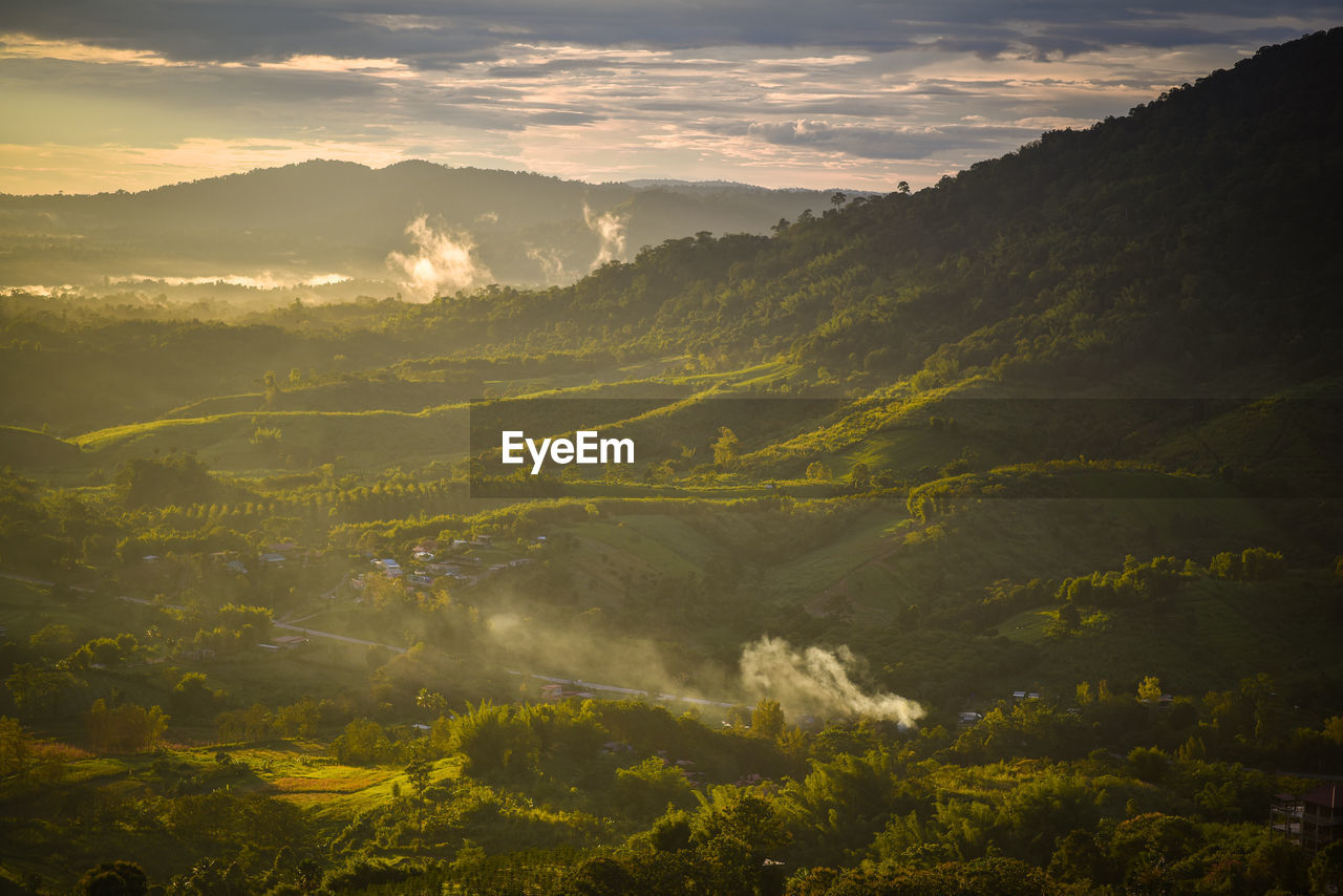 Scenic view of mountains against sky during sunset