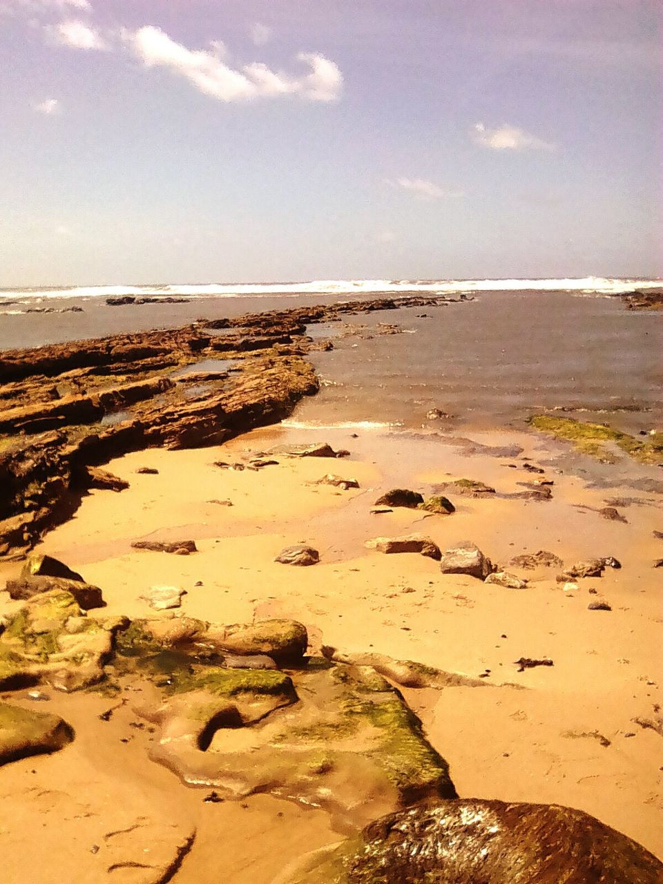 BEACH AGAINST SKY