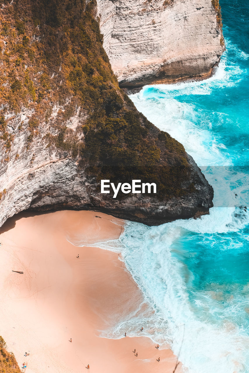 High angle view of rock formation in sea