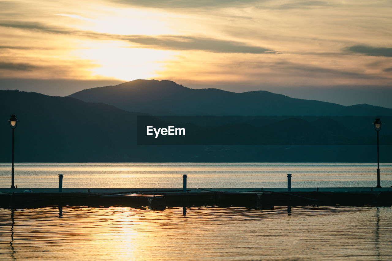 Scenic view of lake during sunset