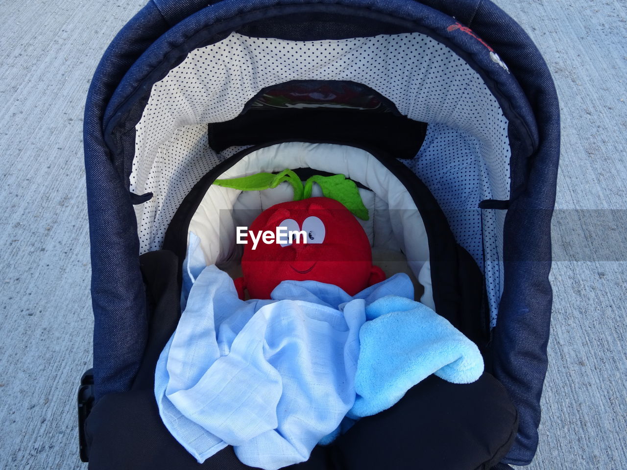 Close-up of toy in baby stroller