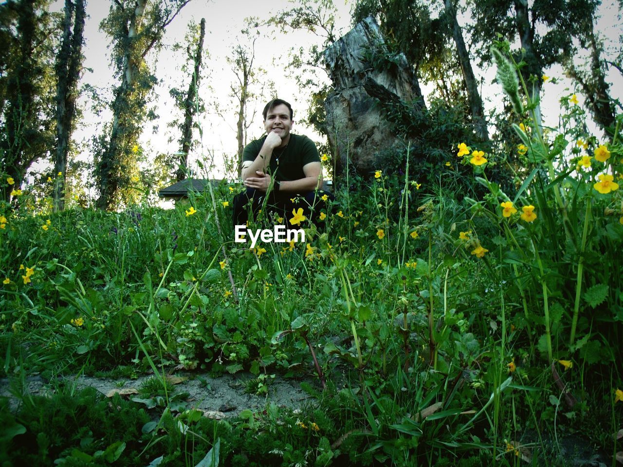 Man sitting on field