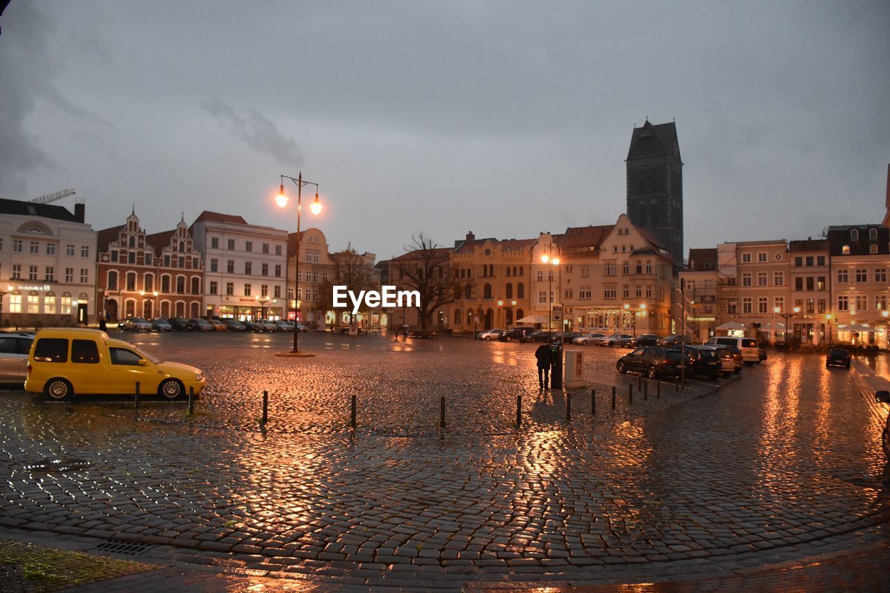 View of illuminated city buildings at night