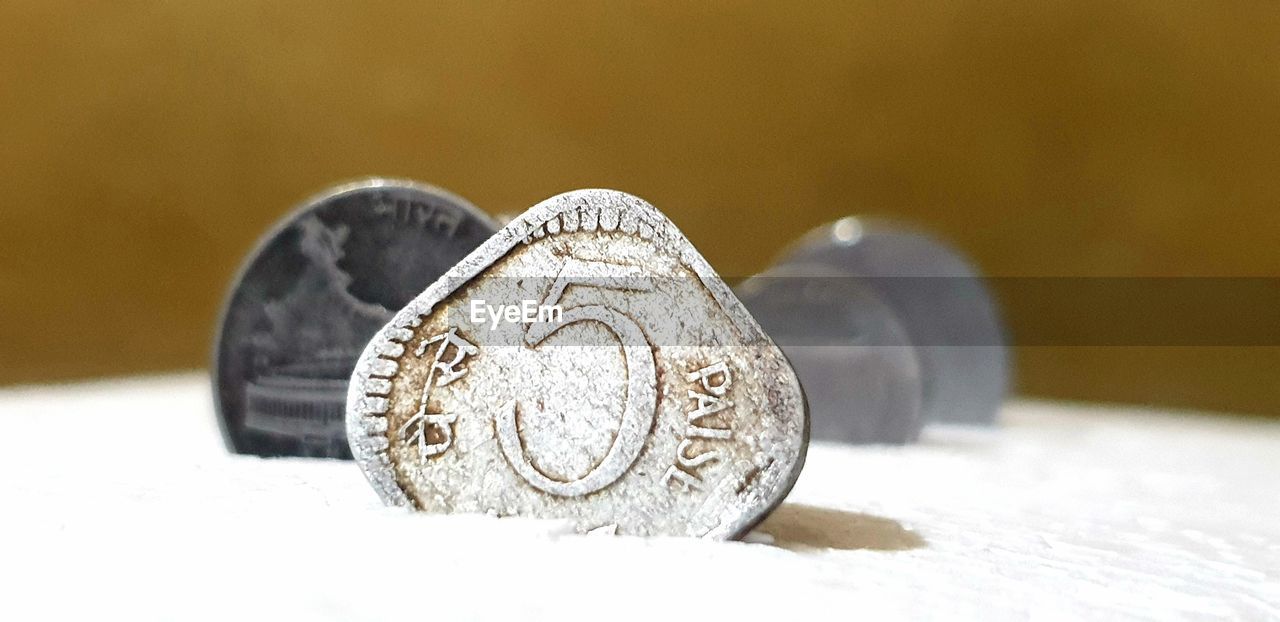 finance, close-up, coin, money, metal, no people, currency, wealth, business, silver, indoors, fashion accessory, jewellery