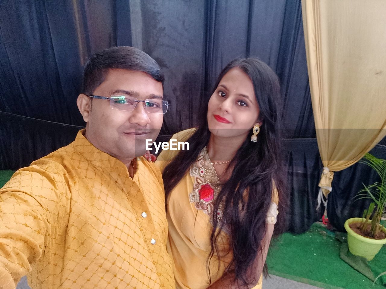 two people, adult, portrait, women, young adult, looking at camera, togetherness, glasses, smiling, men, emotion, person, love, eyeglasses, happiness, waist up, bonding, fashion, clothing, lifestyles, human face, positive emotion, indoors, female, casual clothing, front view, friendship, standing, sitting