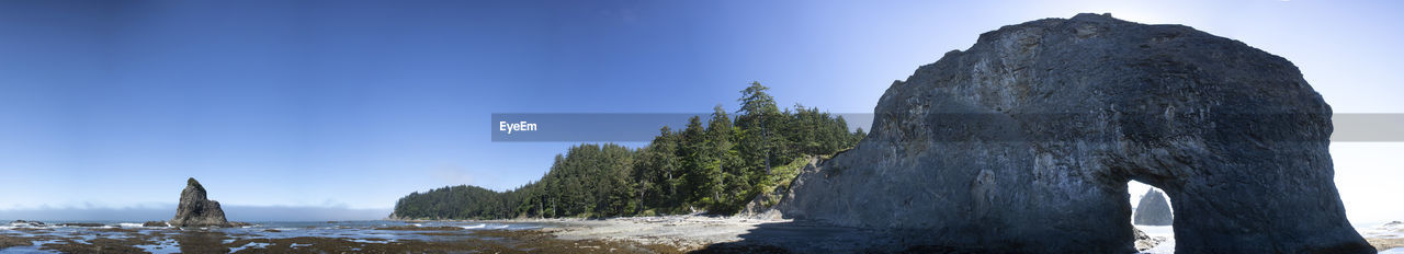 A couple miles north of the famed Rialto Beach, past huge sun bleached logs, tide-pools teaming with starfish, haystack rocks, over huge rounded pebbles along the route Is the Hole-in-the-Wall, which is huge monolith that waves have bored tunnel thru. In a few short centuries this to will likely become another sea-stack dotting the Washington shore. Nature Photography Ocean View Pacific Northwest  Rock Formation Beach Beauty In Nature Blue Sky No People Sea And Sky Seaside The Great Outdoors - 2019 EyeEm Awards