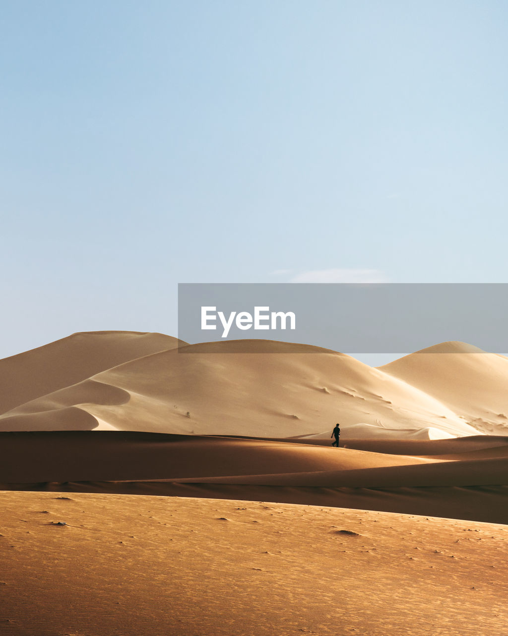 Scenic view of desert against clear sky