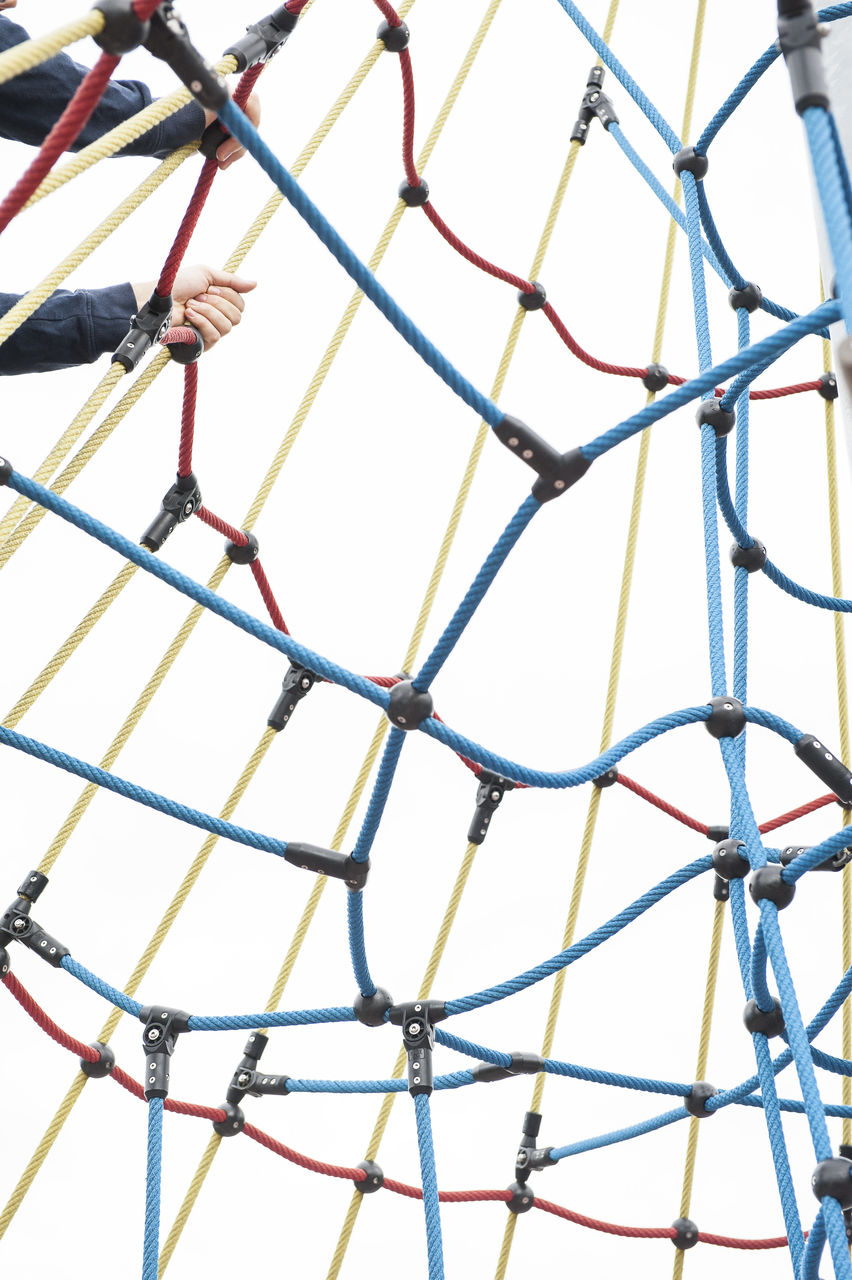 FULL FRAME SHOT OF CHAINLINK FENCE AGAINST SKY