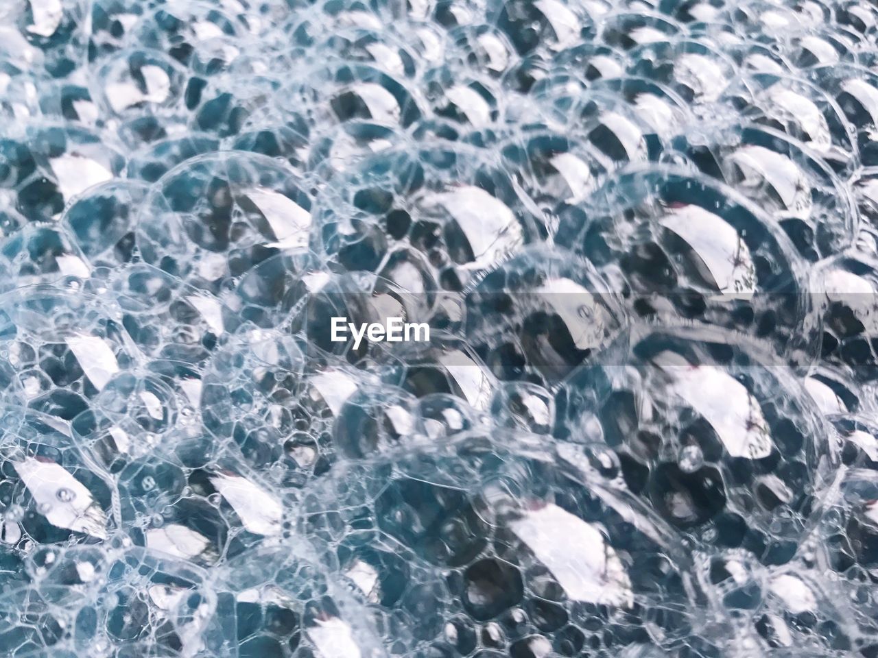 FULL FRAME SHOT OF SWIMMING POOL WITH ICE