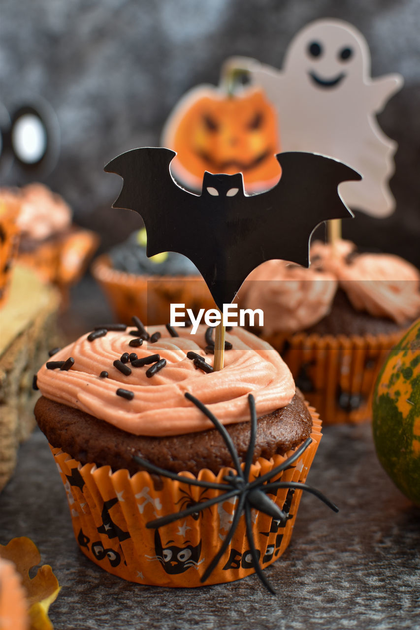 Close-up of halloween cupcake on table