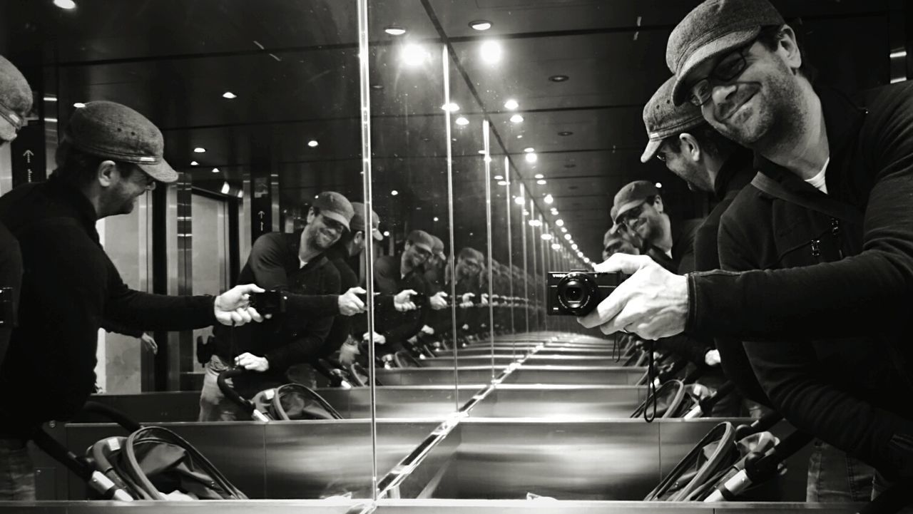 PEOPLE STANDING IN THE DARK