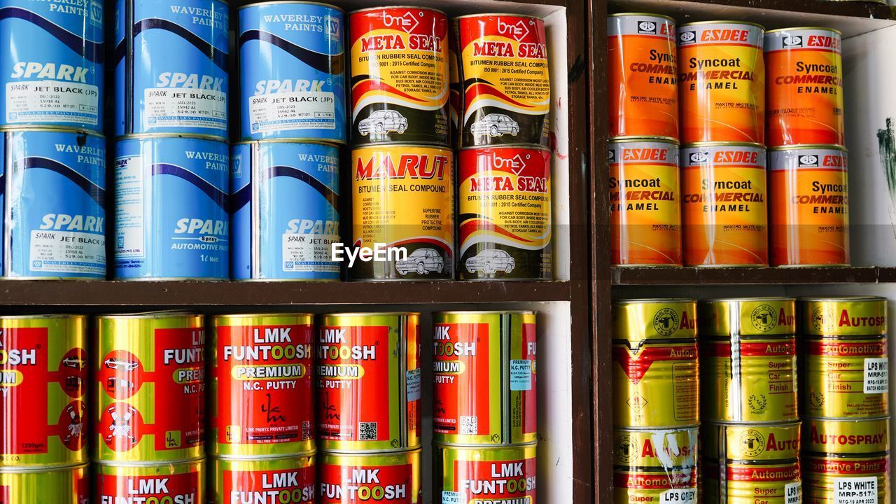 shelf, publication, no people, large group of objects, book, in a row, text, indoors, bookshelf, education, arrangement, communication, order, tin can, container, full frame, abundance