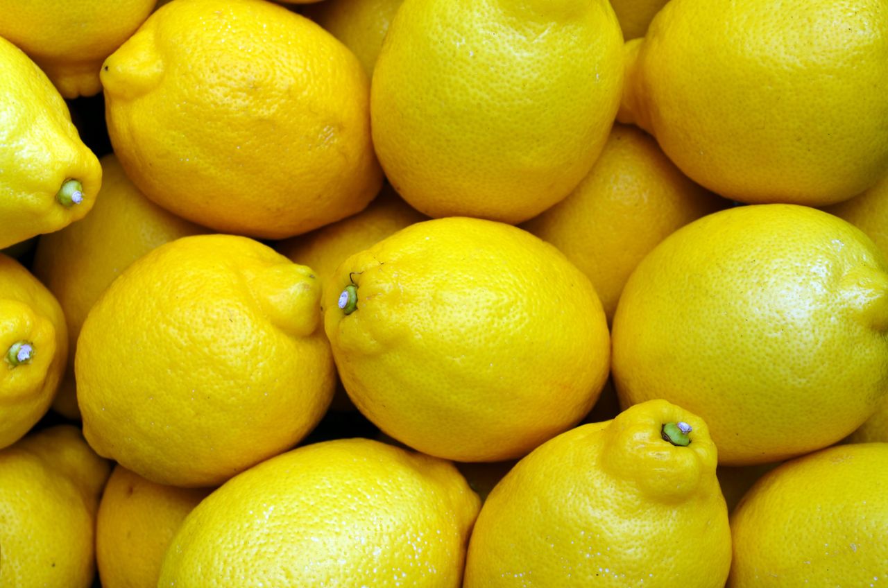 Full frame shot of lemons for sale at market