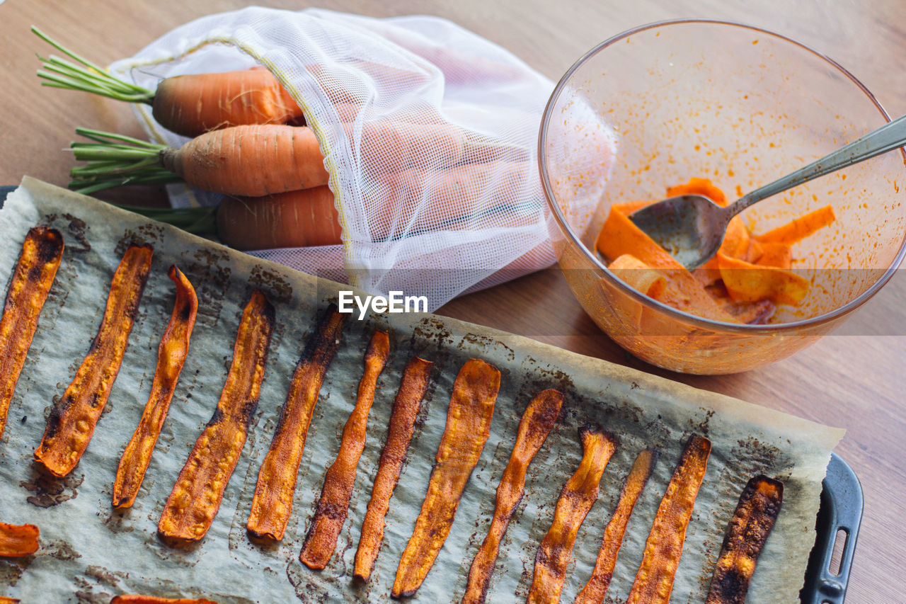 Fresh cooked carrot bacon is on the table. vegetarian food, meat replacement, protein