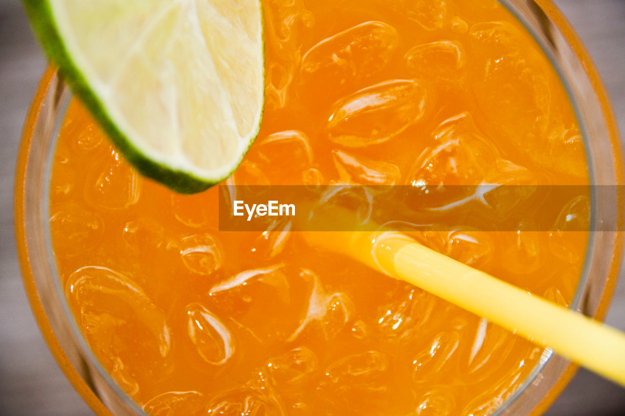 Close-up of orange juice in glass